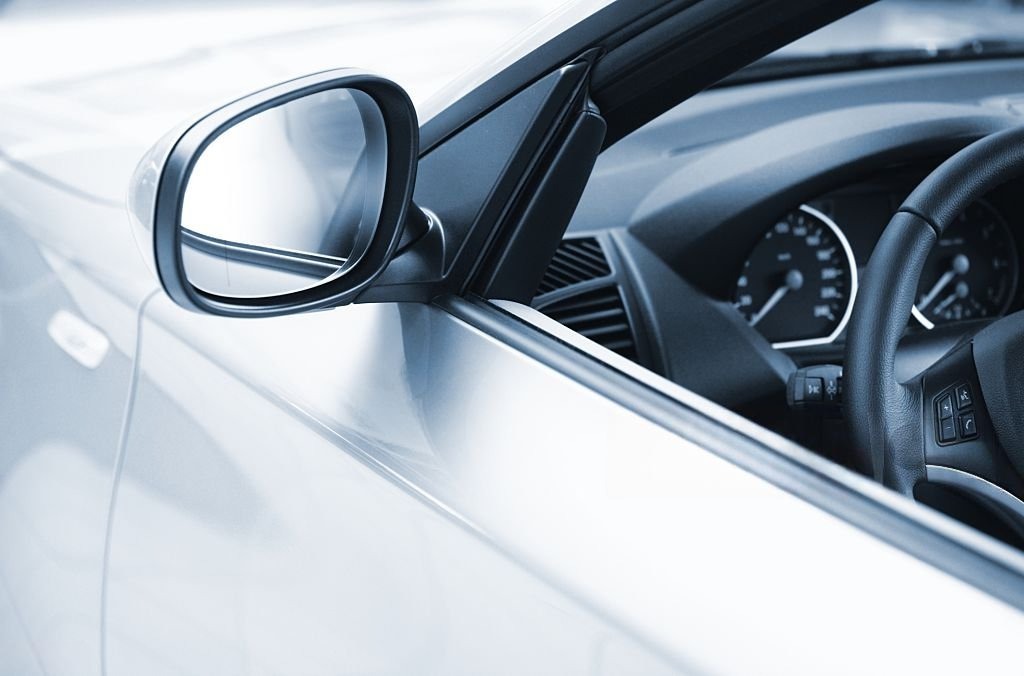 side view of a luxus car. nice sharpness in the mirror